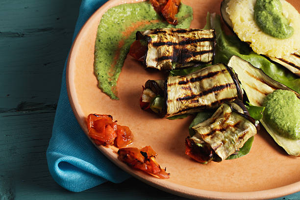 Plate with grilled eggplants closeup stock photo