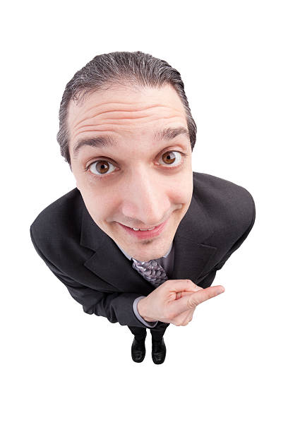 istock Smiling Fisheye Businessman Pointing 484433413