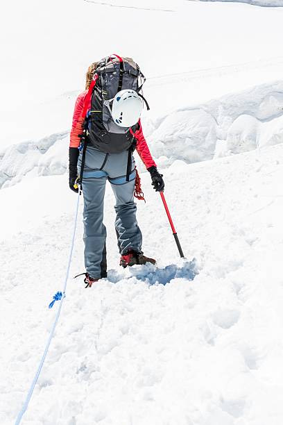 istock Female mountaineer ascending a glacier. 484438262