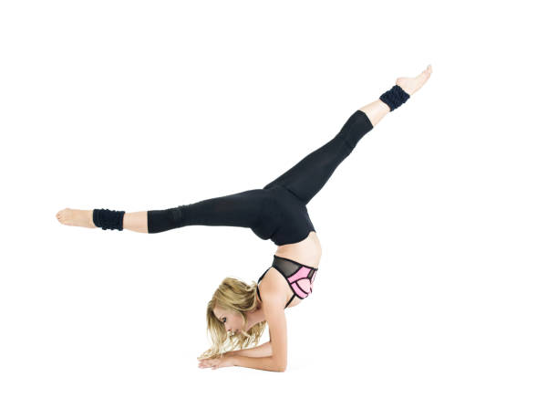 istock Young woman performing yoga 484441648