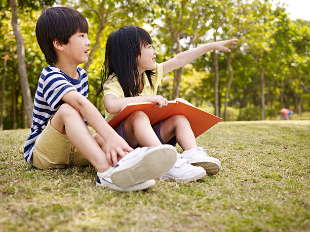 istock two beautiful asian children 484448816
