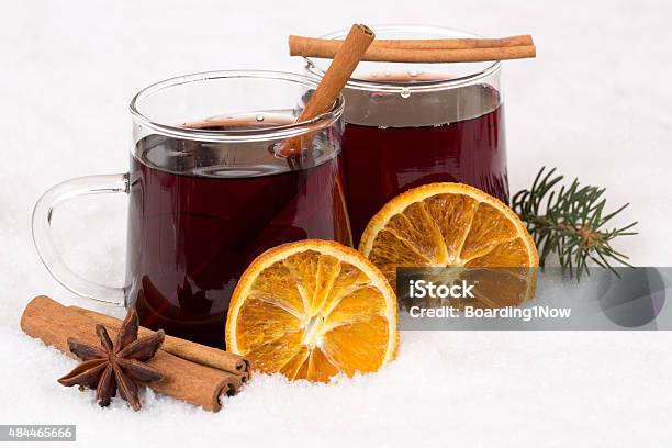 Mulled Wine On Christmas In Winter Alcohol Drink In Snow Stock Photo - Download Image Now