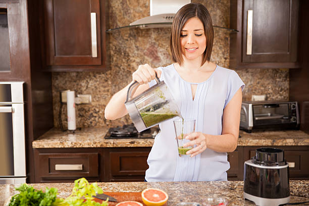 istock Serving some green juice at home 484466002