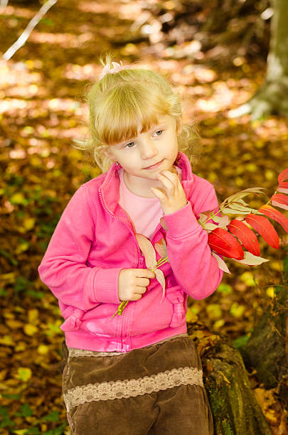 istock blond girl in forrest 484466260