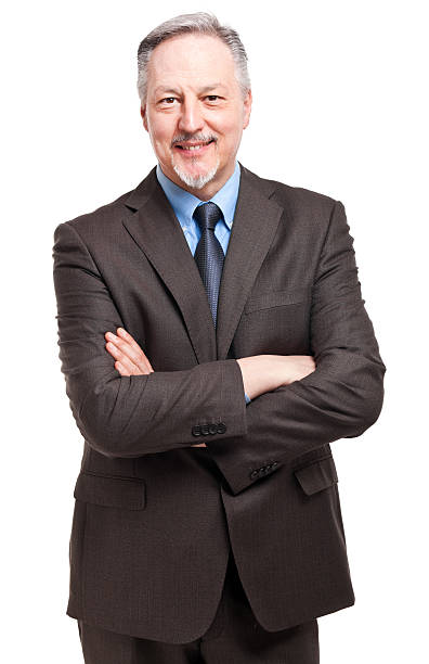 istock Smiling business man isolated on white 484469579