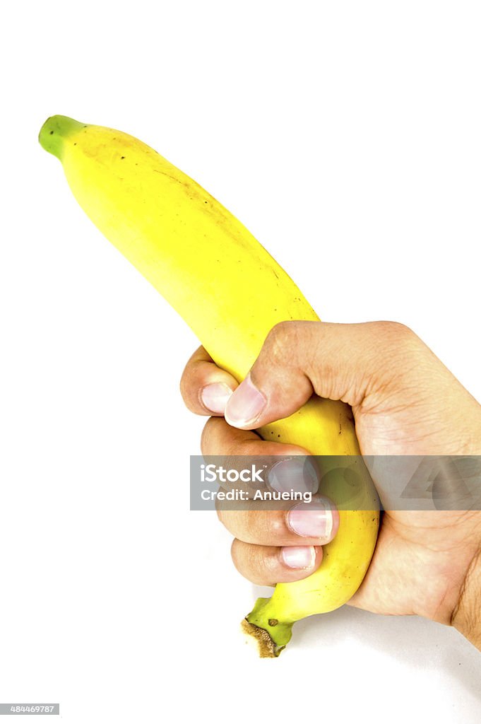 Banana in hand on white background Banana in hand on white backgroundBanana in hand on white background Banana Stock Photo