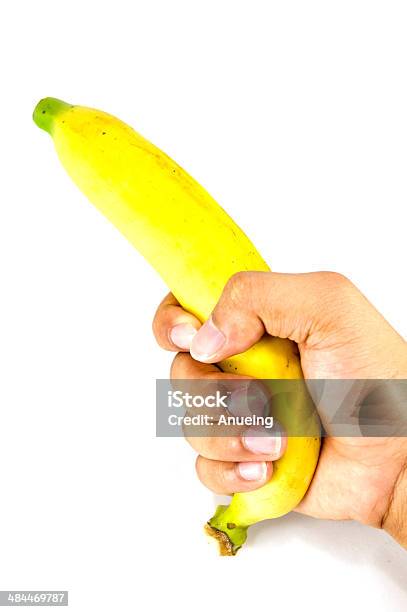 Banana In Hand On White Background Stock Photo - Download Image Now - Banana, Composition, Food