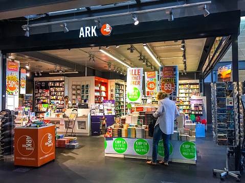 Oslo, Norway  - July 19, 2015: Book Store at Oslo Central Train Station, Norway. Few customers inside the store.