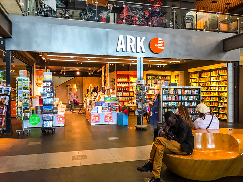 Oslo, Norway  - July 19, 2015: Book Store at Oslo Central Train Station, Norway. Few customers inside and outside the store.