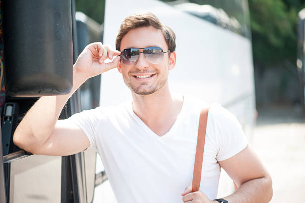 istock Handsome young guy is traveling by public transport 484471816