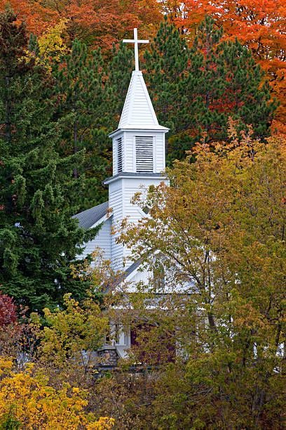 istock White Church Steeple in Autumn 484472367