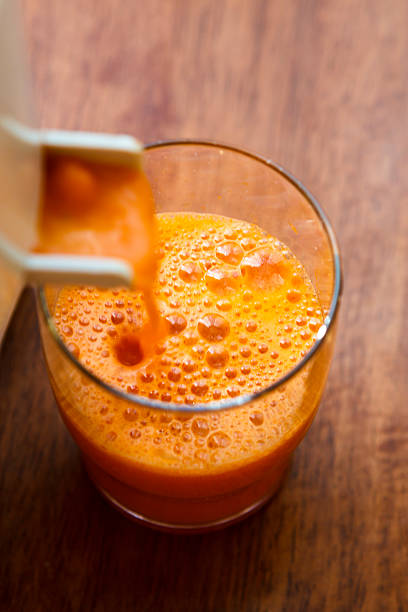 suco de cenoura - carrot juice - fotografias e filmes do acervo