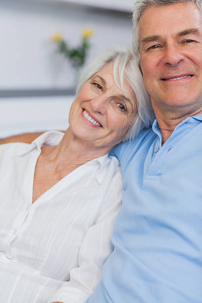 istock Elderly couple embracing 484473817