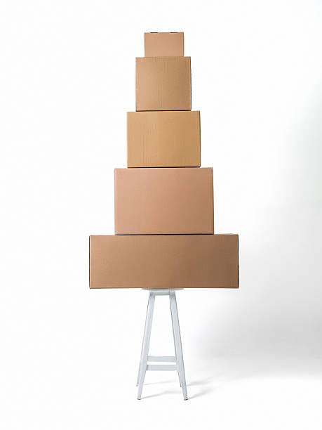istock Boxes standing on wooden chair 484475484