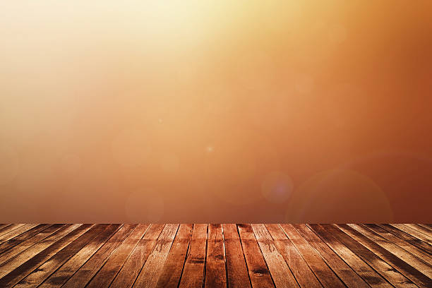 istock wooden floor with warm tone blurred background 484479874