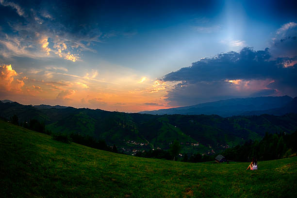 istock Evening, sunset on mountain hills of Simon village. Bran. 484480256