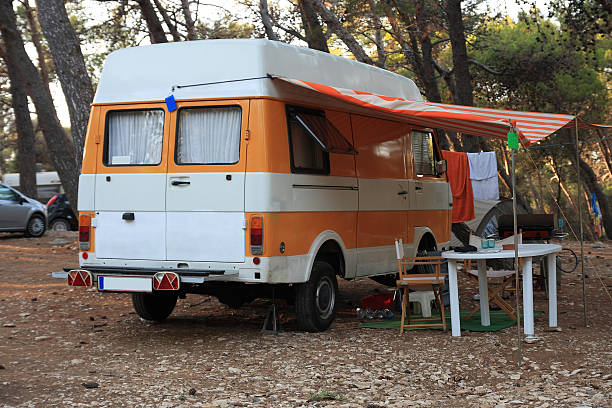istock caravan in sea camp in forest 484483866