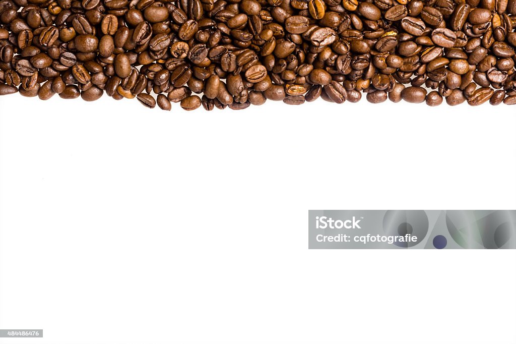 Coffee beans border The rim is a texture of many brown coffee beans. The image has plenty of space for your headline. 2015 Stock Photo