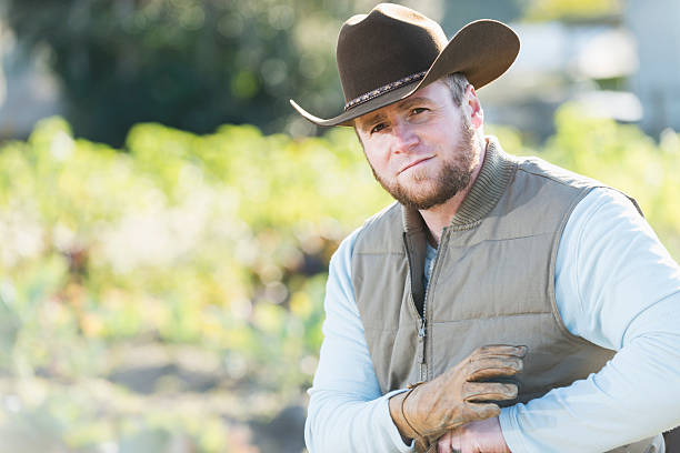 istock Close up of man working on farm 484488034