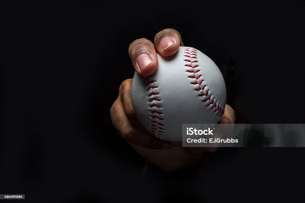 Baseball Curveball Grip If you want to know how to throw a Curveball. Look at the photo that shows the grip Baseball - Sport Stock Photo