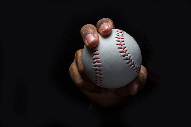 Baseball Curveball Grip If you want to know how to throw a Curveball. Look at the photo that shows the grip baseball players stock pictures, royalty-free photos & images