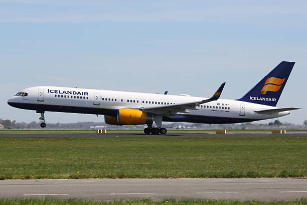 Icelandair Boeing 757-200 airplane Amsterdam, Netherlands - April 21, 2015: An Icelandair Boeing 757-200 with the registration TF-FIT takes off from Amsterdam Airport (AMS) in the Netherlands. Icelandair is the flag carrier airline of Iceland with headquarters in Keflavik. boeing 757 stock pictures, royalty-free photos & images