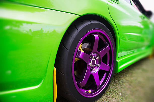 Close-up of tires of a car isolated on white background
