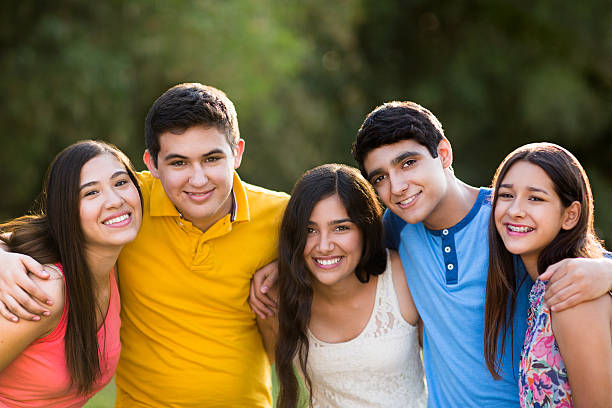 istock Latin American young friends in park 484507502