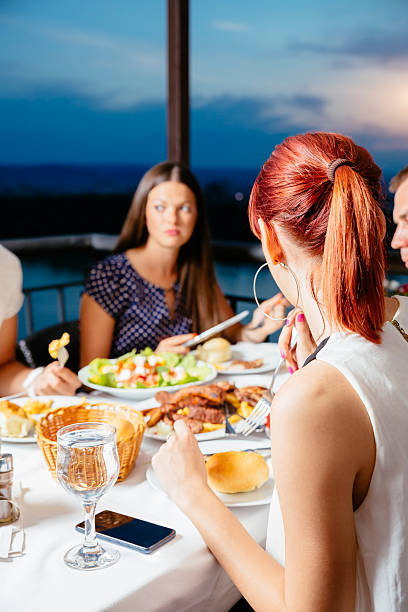 istock Group Of Friends In Restaurant 484508200