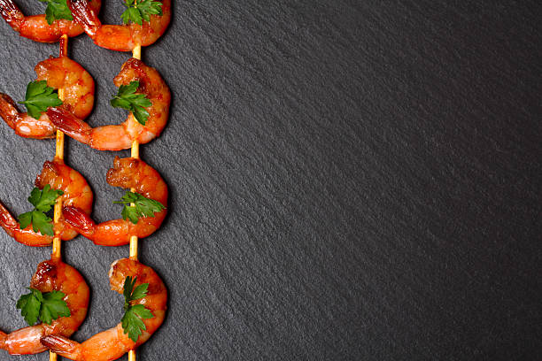 istock shrimps on the skewers 484511548