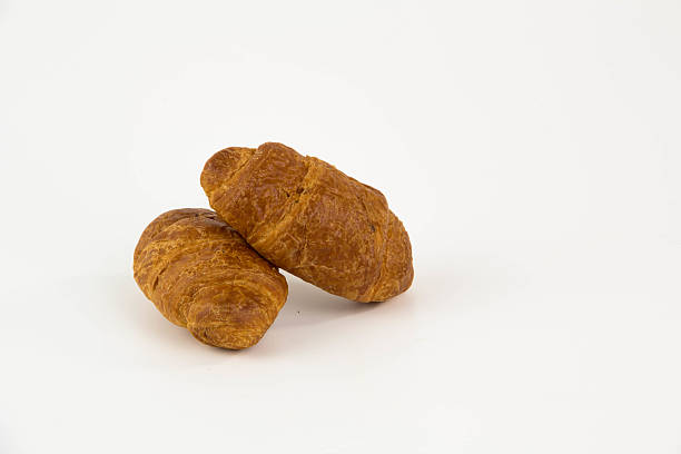 istock croissants isolated on white background 484511820