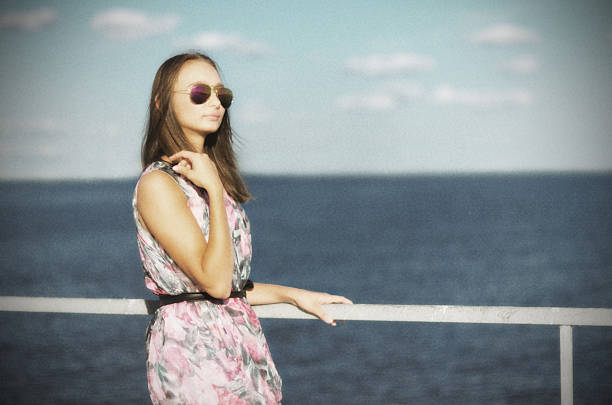 Redhead girl posing outdoor during sunset