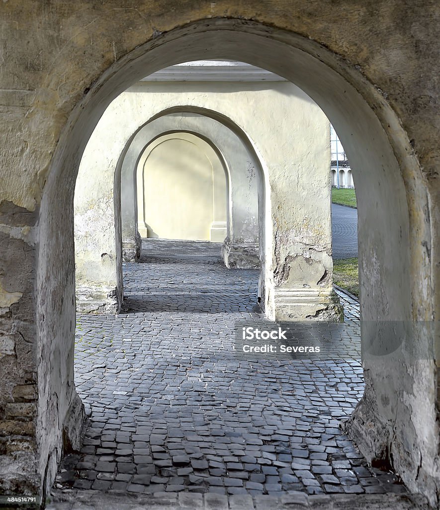 Old arches of Vilnius monastery Old arches of Vilnius monastery. Early spring morning Ancient Stock Photo