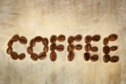 Coffee beans spelling out the word 