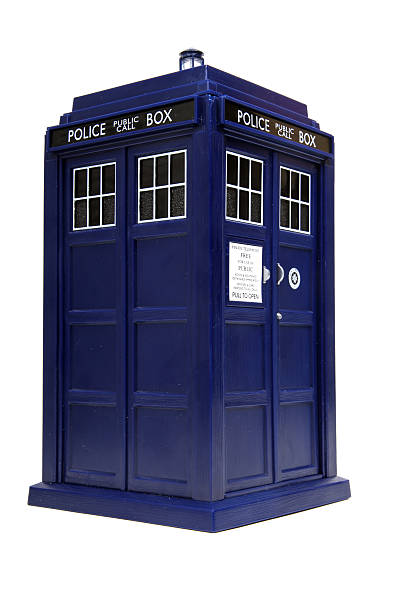 Great and Mysterious Blue Box Vancouver, Canada - February 17, 2014: A toy TARDIS from Dr. Who, against a white background. The TARDIS is the Doctor's main form of travel, a time machine and spaceship that is larger on the inside. Doctor Who is created by the BBC. bbc photos stock pictures, royalty-free photos & images