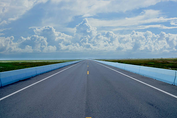 istock Blue sky with could, Empty road and the traffic lines. 484516491