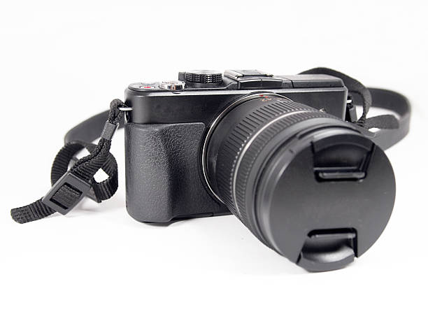 istock digital mirrorless camera with zoom lense isolated on white background 484516505