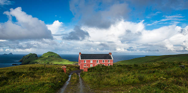 istock Irish scenic landscape with a red timber home 484517209