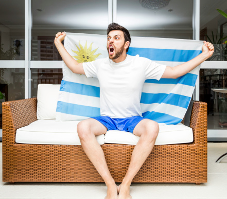 Uruguayan fan celebrates at home