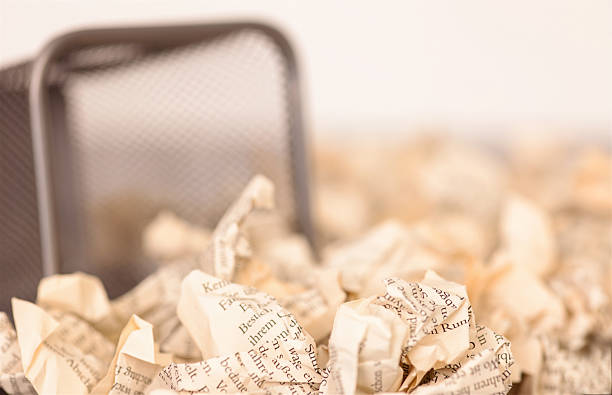 istock Wastepaper basket with wrinkled paper 484517255