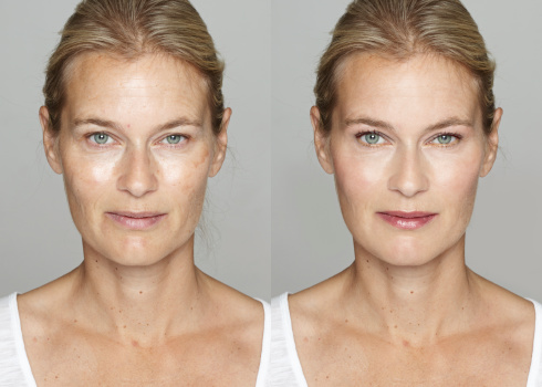 Woman with applied makeup created digitally in realistic way.