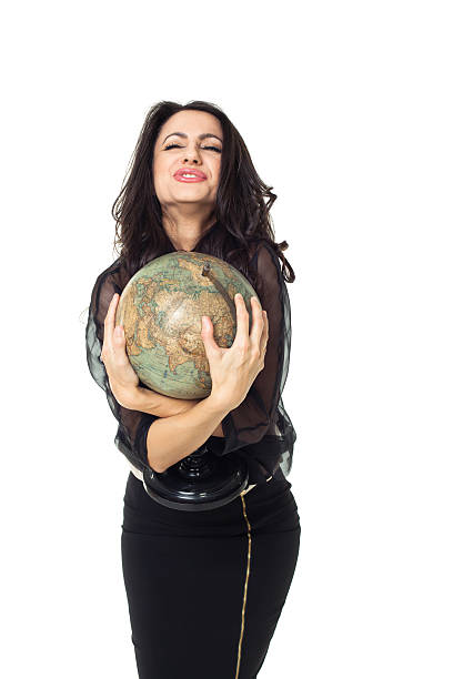 istock Young woman with globe on isolated background 484521015