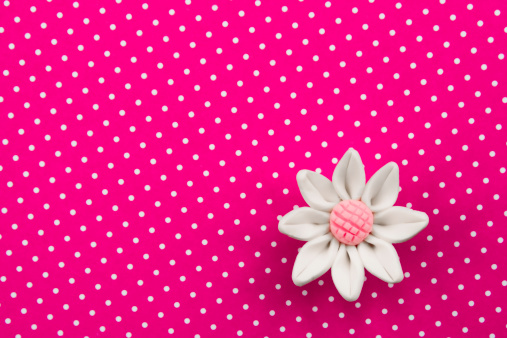 Decoration with clay flower and polka dots paper.