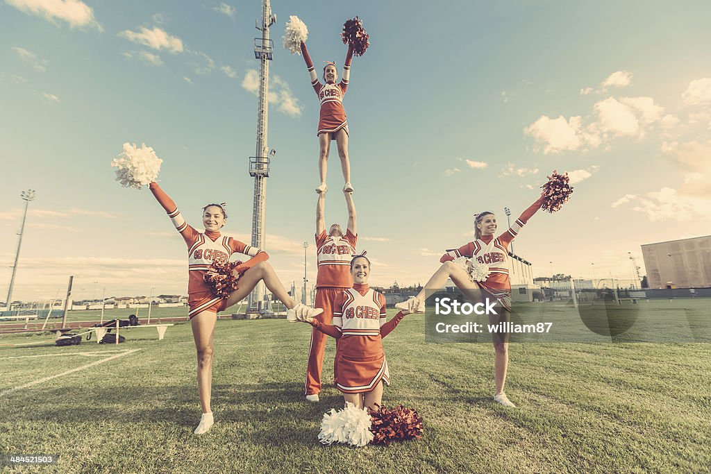 Group of Cheerleaders in the Field Cheerleader Stock Photo