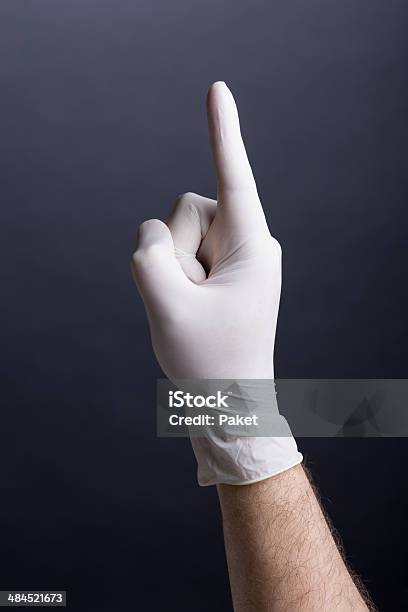 Male Hand In Latex Glove Finger Up Stock Photo - Download Image Now - Adults Only, Clean, Close-up