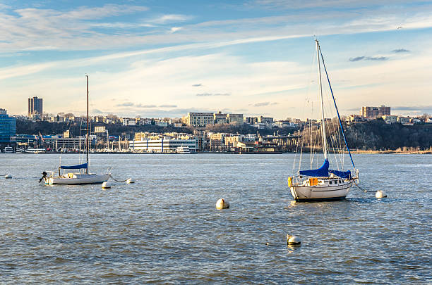 istock Sailing Boats on a River at Sunset 484522612