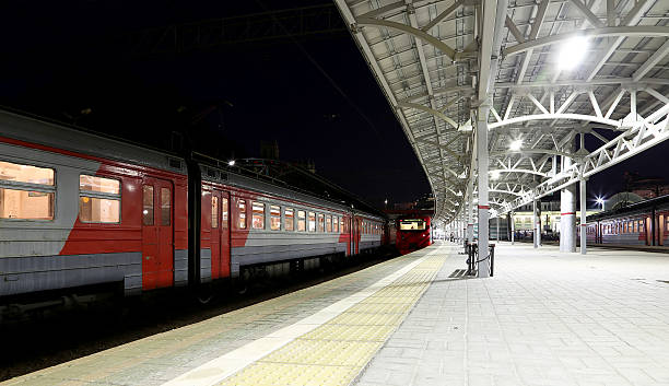 istock Train on Moscow passenger platform at night  in Moscow 484525520