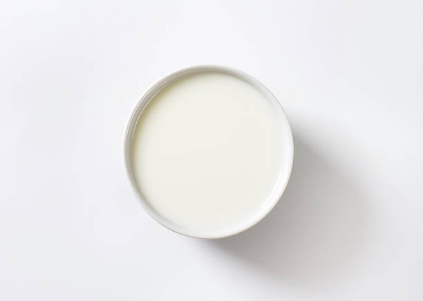 Bowl of fresh milk stock photo