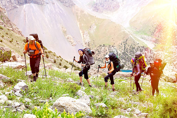 istock Group of people walking on trail 484537614