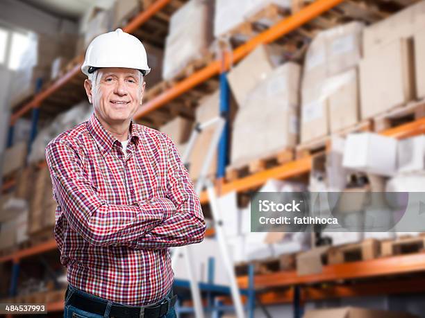 Warehouse Businessman Stock Photo - Download Image Now - Senior Adult, Warehouse Worker, 30-39 Years